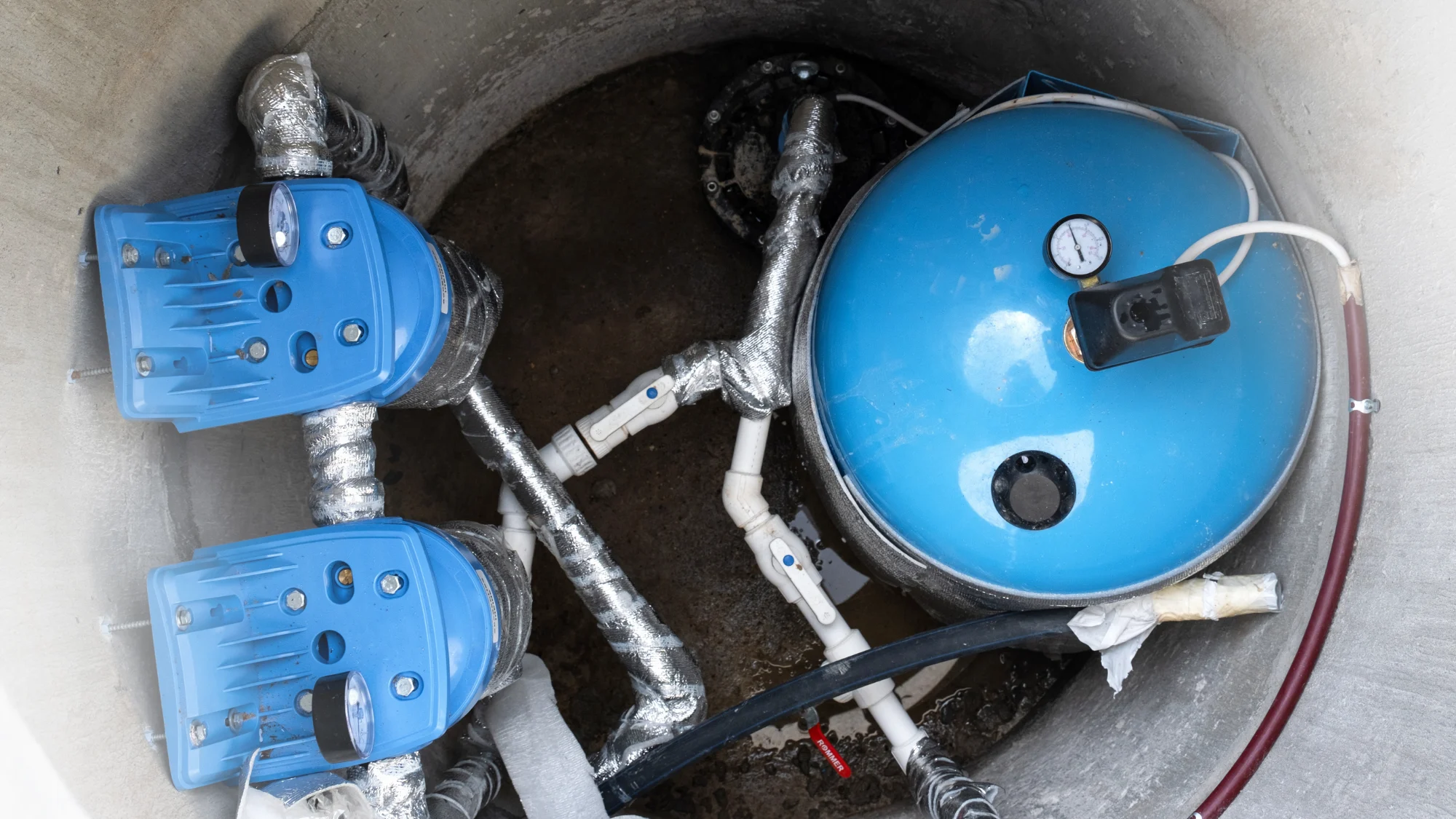 Well Pump Repair Somers Ct Well pump system with pressure tank and controls used for well pump repair in Somers, CT